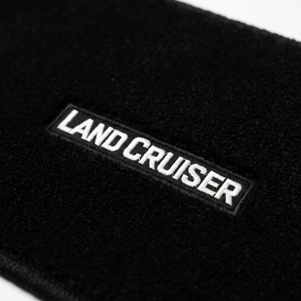 Land Cruiser Embroidered Badge Detail - Premium Car Mat